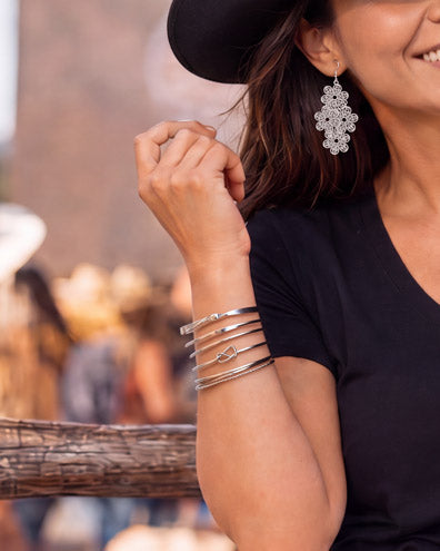 Product image featuring the Bandera Stackable Bangles in silver.​