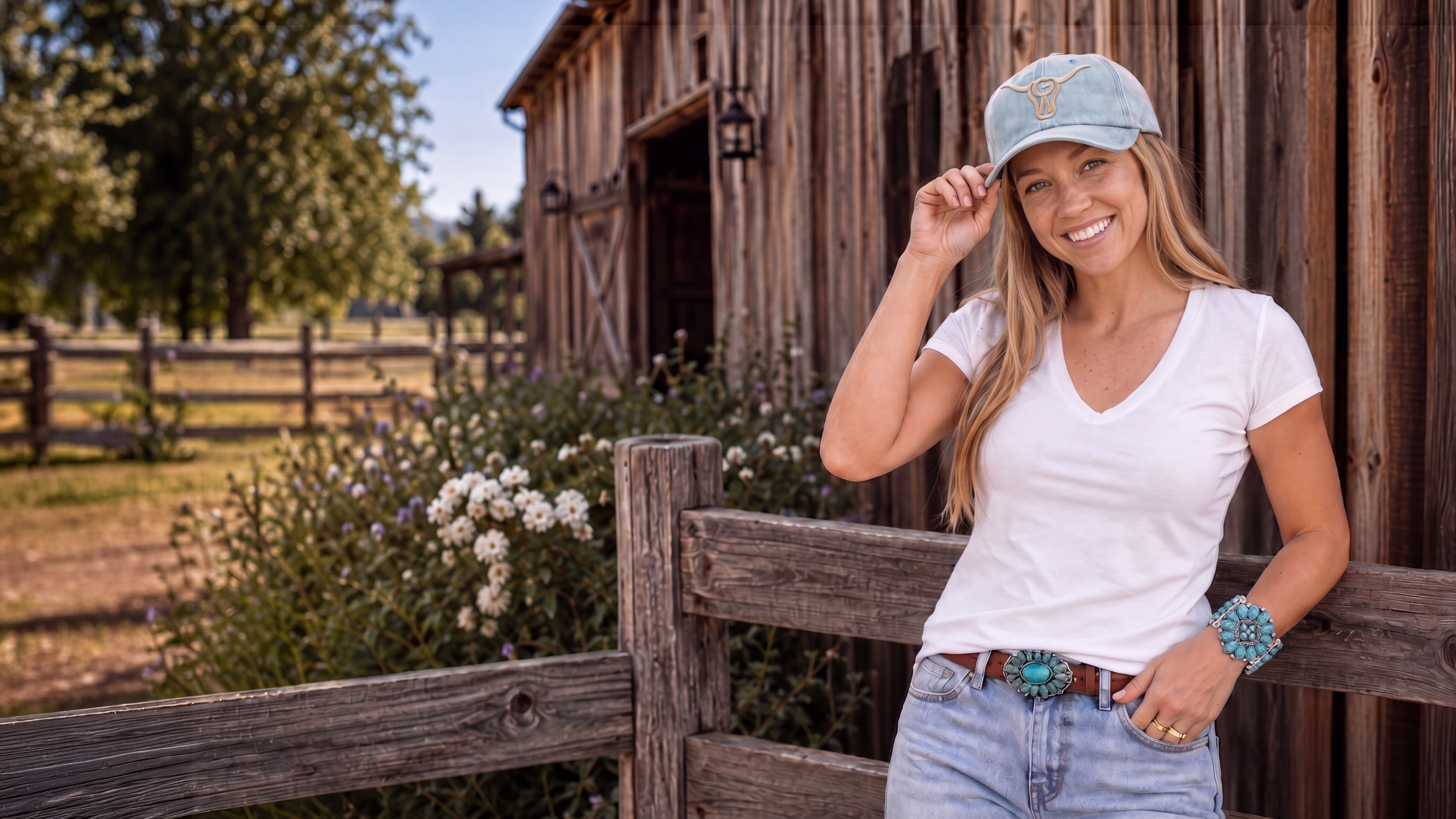 A woman in Western-inspired style wearing the Turquoise Crown Cuff.​