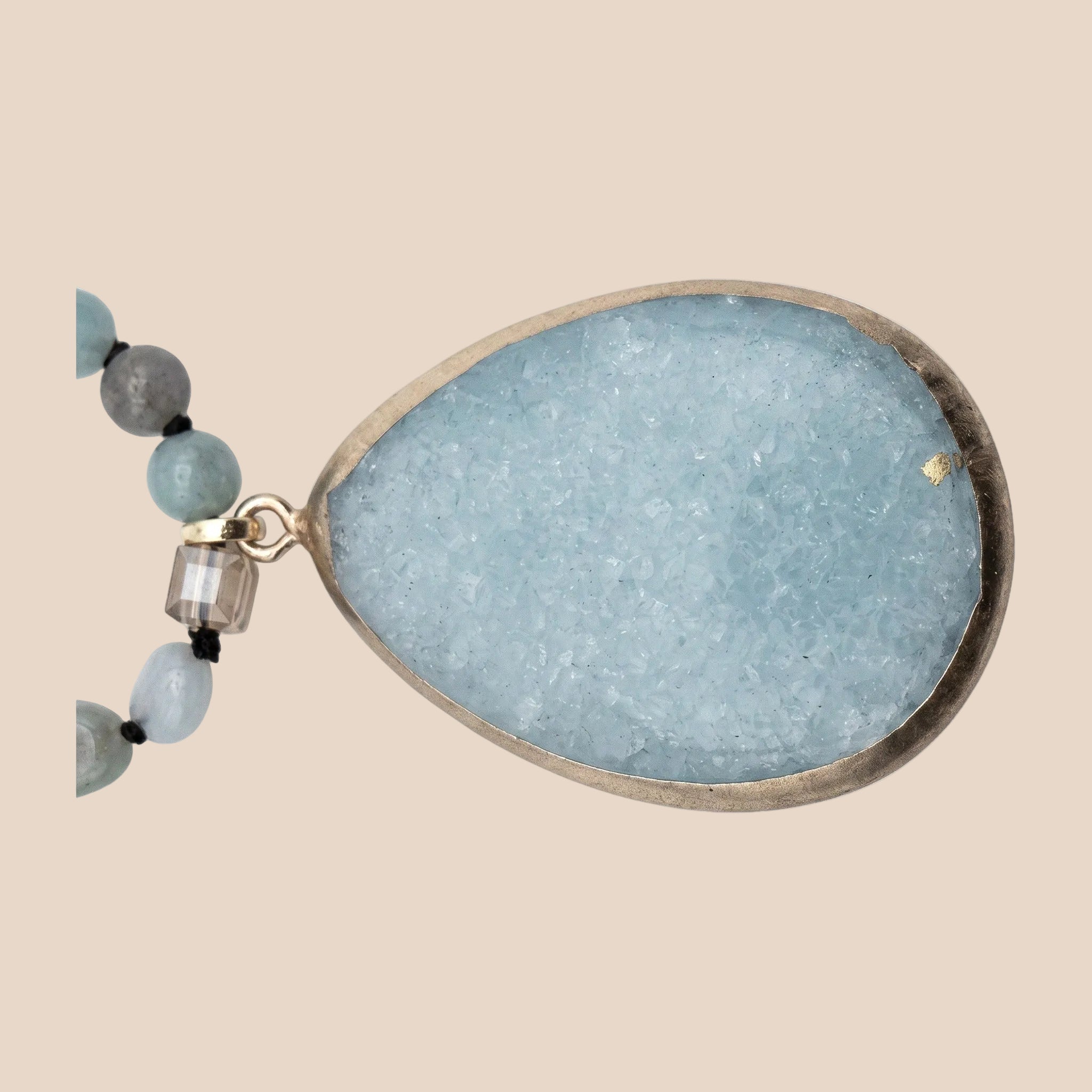 A close crop of a jewelry texture filling the frame.