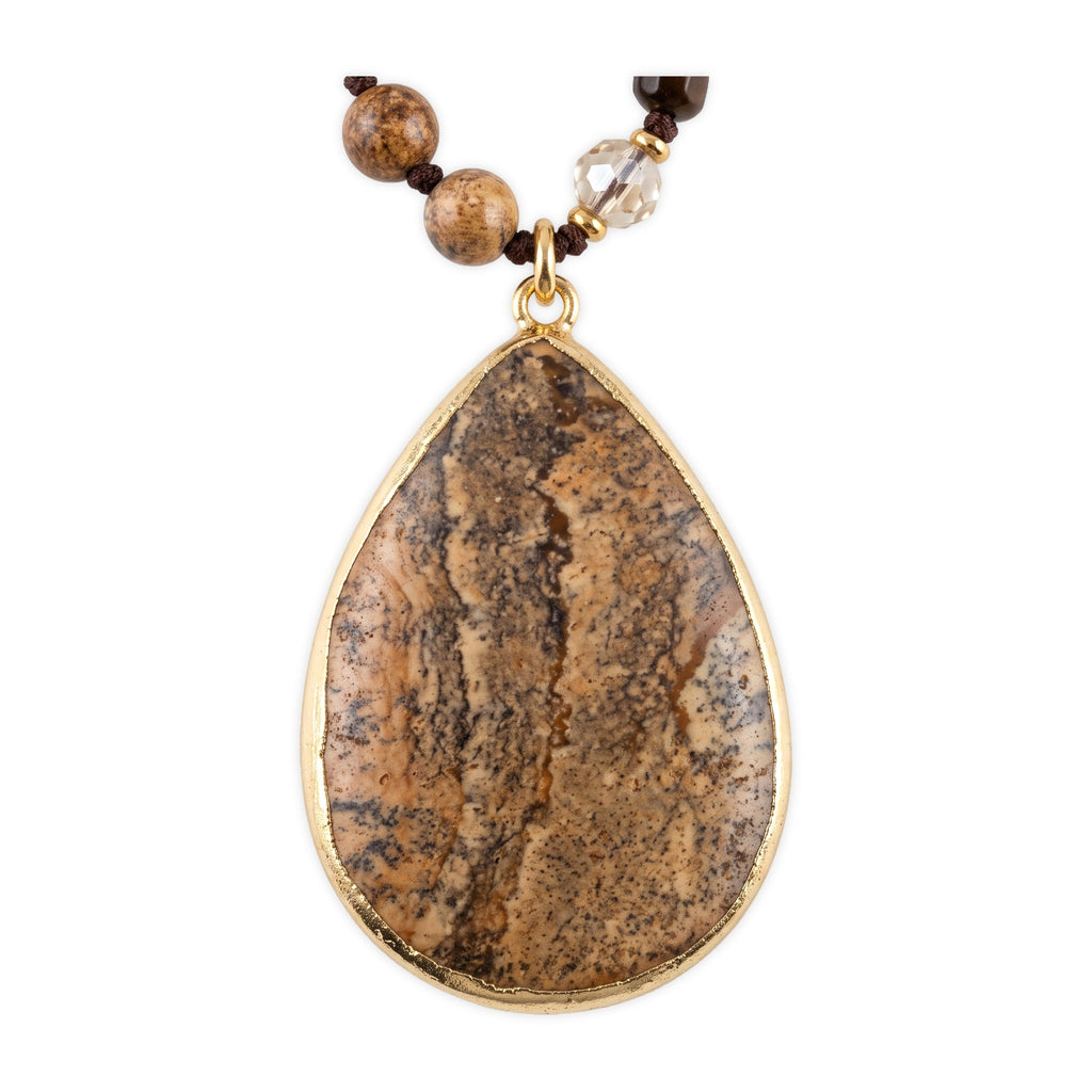 Close-up of the pendant on Desert Stone Necklace — Tiger eye.​