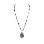 Desert Stone Necklace — Dalmation Gray arranged in a draped flat lay.​