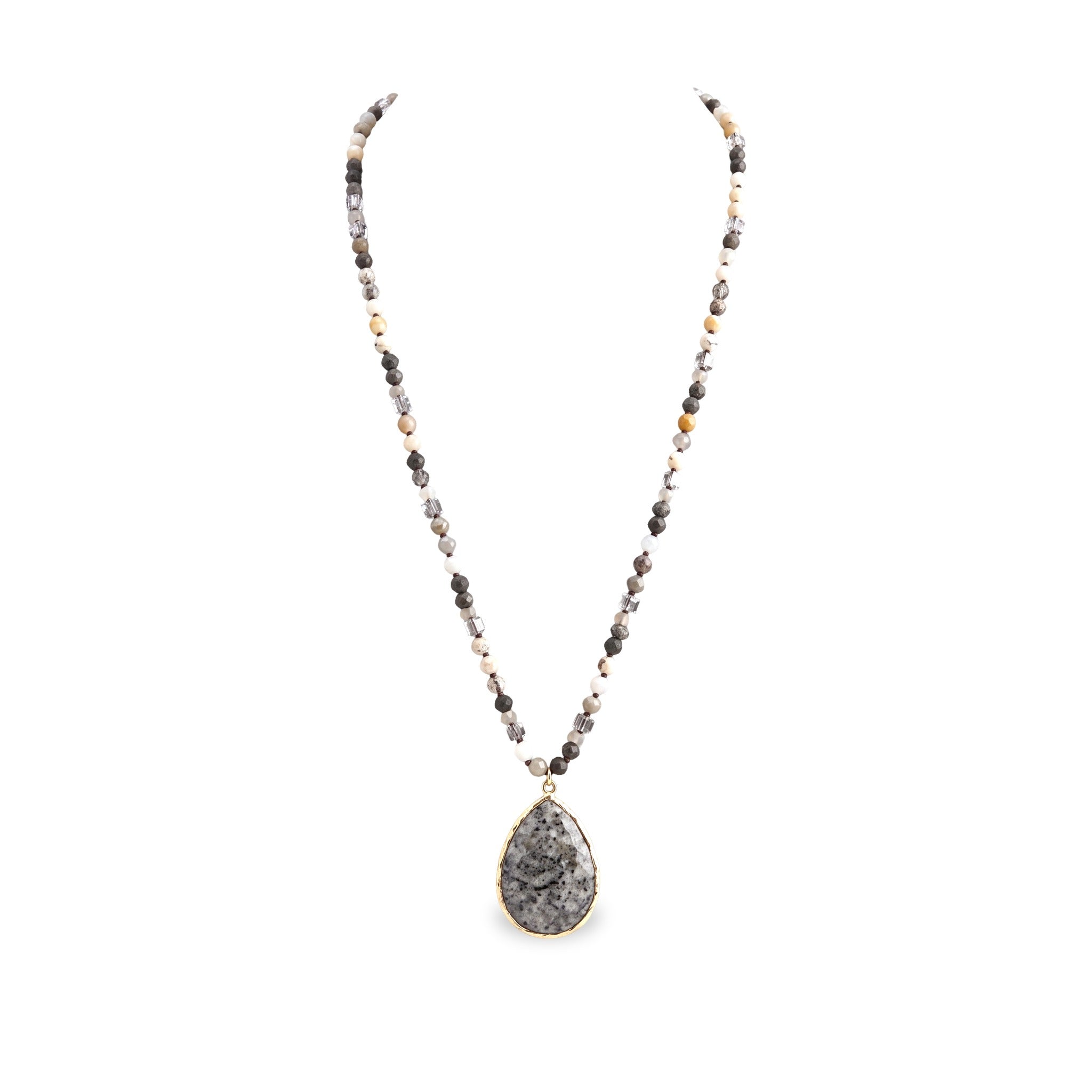 Desert Stone Necklace — Dalmation Gray arranged in a draped flat lay.​