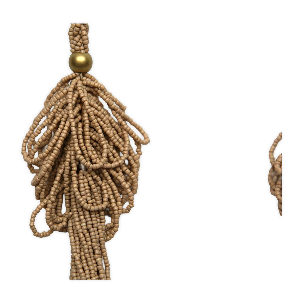 Close-up of the pendant on Golden Canyon Layered Necklace.​