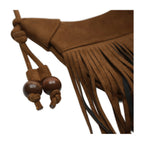 Close-up of the strap hardware on River Run Fringe Bag — Camel.​