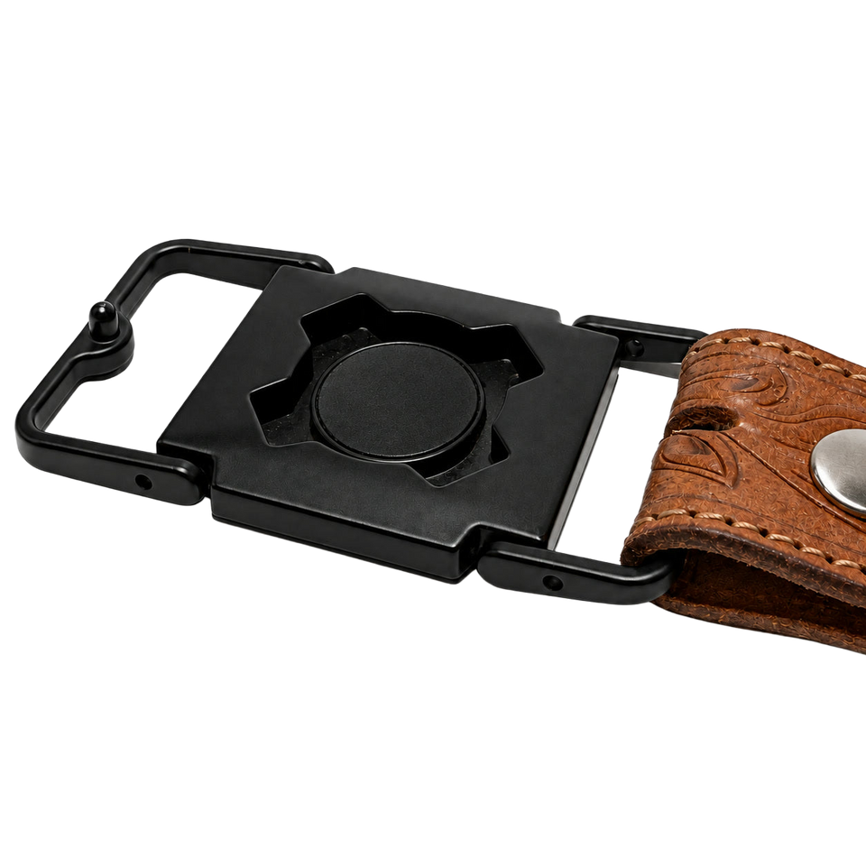 Black iBuckle Switch Base attached to a brown tooled belt; belt sold separately.